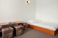 Postel nebo postele na pokoji v ubytování Hotel Adršpach