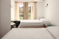 Postel nebo postele na pokoji v ubytování Hotel Adršpach