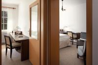 Postel nebo postele na pokoji v ubytování Hotel Adršpach