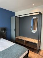 OZO Hotels Antares Airportにあるベッド