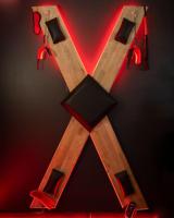 a wooden cross with speakers and lights on a wall at Hébergement insolite, Night Secret Groot in Millau