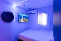 Ein Bett oder Betten in einem Zimmer der Unterkunft סוויטות אוראל 432