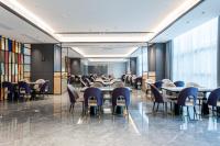 Χώρος καθιστικού στο Mehood Elegant Hotel Guangzhou Baiyun Airport Huadu Cultural Tourism City