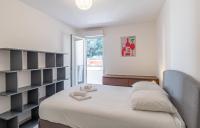 Un ou plusieurs lits dans un hébergement de l&#39;établissement One Bedroom Flat Near Monaco