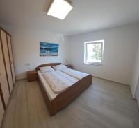 Łóżko lub łóżka w pokoju w obiekcie Apartmani Totić