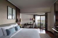 Postel nebo postele na pokoji v ubytování Anantara Riverside Bangkok Resort