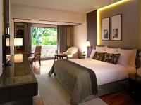 Postel nebo postele na pokoji v ubytování Anantara Riverside Bangkok Resort