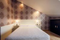 Postel nebo postele na pokoji v ubytování Apartamentos Spa Villa Pasiega