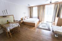 Posteľ alebo postele v izbe v ubytovaní Atmoszféra Apartman