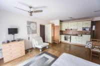 Kuchyňa alebo kuchynka v ubytovaní Atmoszféra Apartman