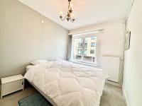 A bed or beds in a room at Phebus 0101 - Vue Mer