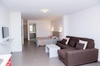 TV a/nebo společenská místnost v ubytování Apartamentos El Palmar