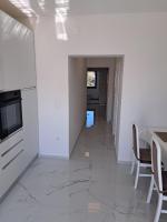 Telewizja i/lub zestaw kina domowego w obiekcie Apartmani Totić