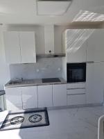Kuchnia lub aneks kuchenny w obiekcie Apartmani Totić