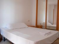 Postel nebo postele na pokoji v ubytování Oropesa Ciudad de Vacaciones 3000