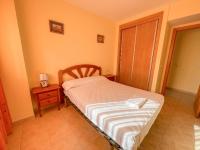 Postel nebo postele na pokoji v ubytování Oropesa Ciudad de Vacaciones 3000