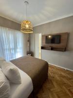 Hotel Facon Grandeにあるテレビまたはエンターテインメントセンター