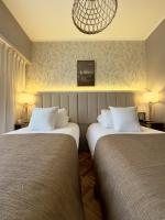 Hotel Facon Grandeにあるベッド
