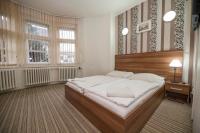 Postel nebo postele na pokoji v ubytování Apartmány u jezera Fami***
