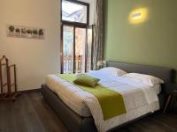 A bed or beds in a room at Home in Orvieto - corso Cavour 138