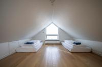 Ilulissat Stay - 4-bedroom villa with sea view and hot tubにあるベッド
