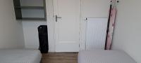 Postel nebo postele na pokoji v ubytování 105,3 appartement 200m van strand