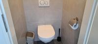 Koupelna v ubytování 105,3 appartement 200m van strand
