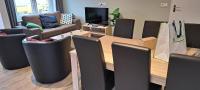 Posezení v ubytování 105,3 appartement 200m van strand