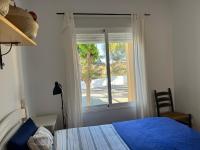A bed or beds in a room at Casa Montana near the Coast