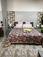 A bed or beds in a room at Marzamemi Da Giusy