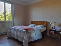 Een bed of bedden in een kamer bij Maison de campagne Lot/Dordogne