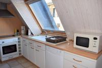Kuchnia lub aneks kuchenny w obiekcie Appartement 5 pers sur la plage à Ploumanac'h, VUE MER à PERROS-GUIREC - Réf 897