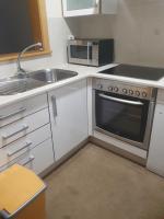 Kuchyň nebo kuchyňský kout v ubytování Apartamento en urbanización con piscina en Playa de Silgar