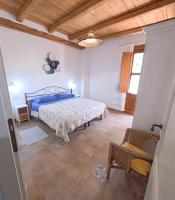 A bed or beds in a room at Apartment Conchiglie 2