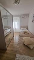 Postel nebo postele na pokoji v ubytování Apartment Vestibul Inn
