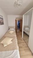 Postel nebo postele na pokoji v ubytování Apartment Vestibul Inn