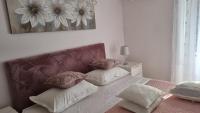 Postel nebo postele na pokoji v ubytování Apartment Vestibul Inn