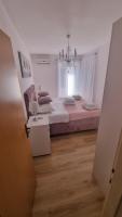 Postel nebo postele na pokoji v ubytování Apartment Vestibul Inn