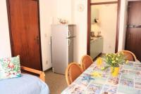A bed or beds in a room at Comfy flat just 80m from the beach