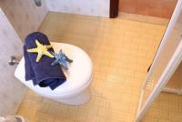 A bathroom at Comfy flat just 80m from the beach