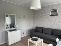 Posedenie v ubytovaní Apartament Ogrody