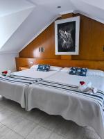 Postel nebo postele na pokoji v ubytování Hotel Arillo