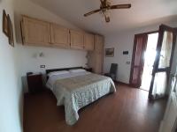 Agriturismo Val di Nappoにあるベッド