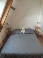 Łóżko lub łóżka w pokoju w obiekcie Gîtes les Deux Vallées