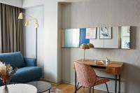 A seating area at voco Madrid Retiro by IHG