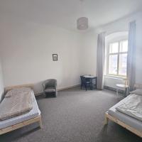 Postel nebo postele na pokoji v ubytování Zámek Ruda nad Moravou