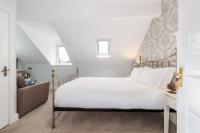 Postel nebo postele na pokoji v ubytování Cragwood Guesthouse