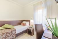 Posteľ alebo postele v izbe v ubytovaní Hotel Hambros - Il Parco in Villa Banchieri