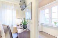 Televízia a/alebo spoločenská miestnosť v ubytovaní Hotel Hambros - Il Parco in Villa Banchieri