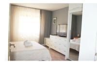 Posteľ alebo postele v izbe v ubytovaní Apartment Brazuca-Center